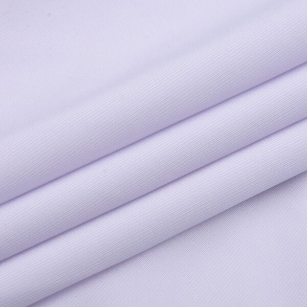 Roll of durable swim lycra fabric in natural color
