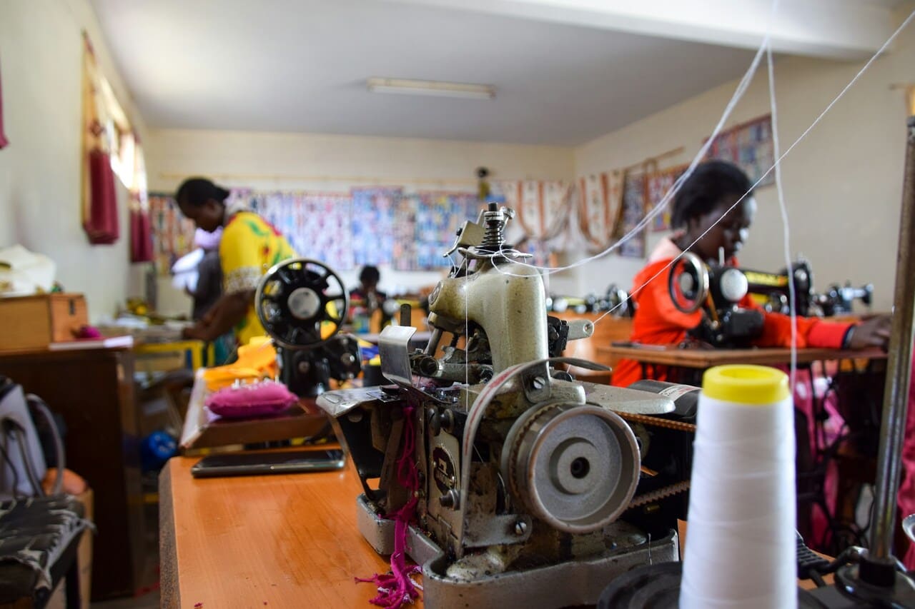 Custom fabric printing for small businesses with rolls of printed fabric