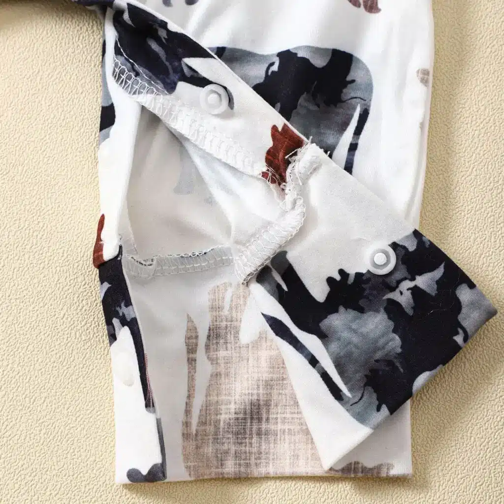 Lightweight cow print baby summer outfit with unisex design