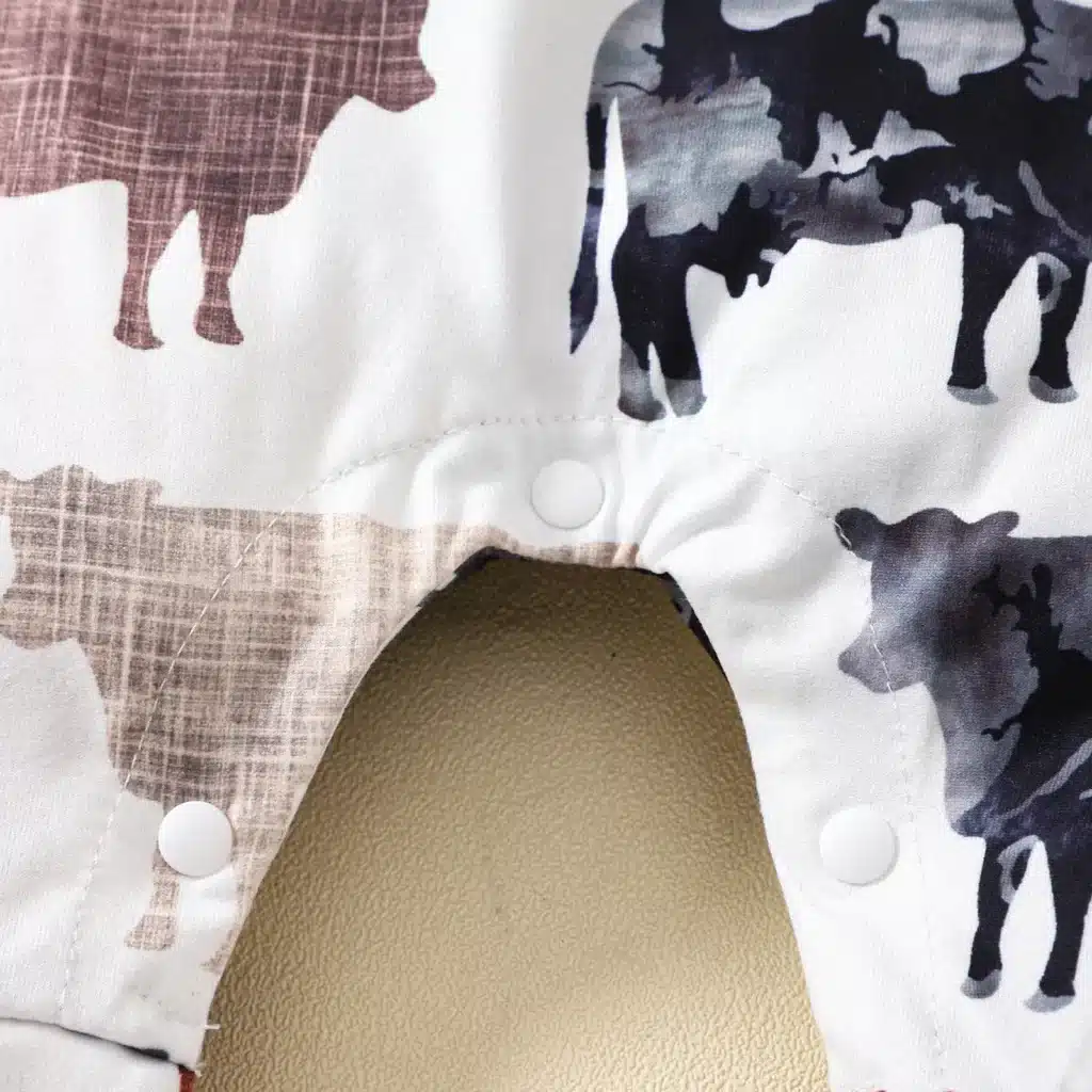 Sleeveless cow print baby outfit designed for summer comfort