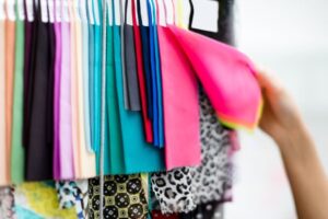 Polyester vs spandex fabric comparison showing texture and stretch differences