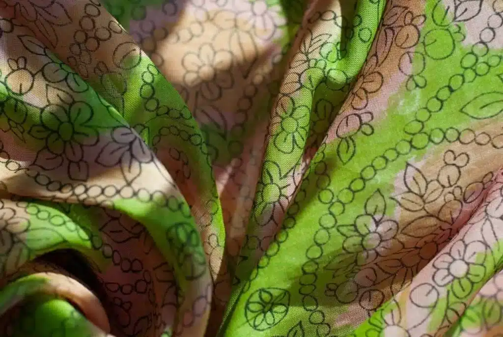 Close-up of cotton fabric printing showing ink absorption and natural texture