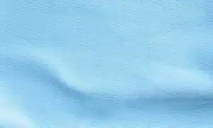 Rayon poplin fabric texture showing a smooth and lightweight woven surface