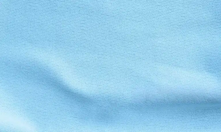Rayon poplin fabric texture showing a smooth and lightweight woven surface