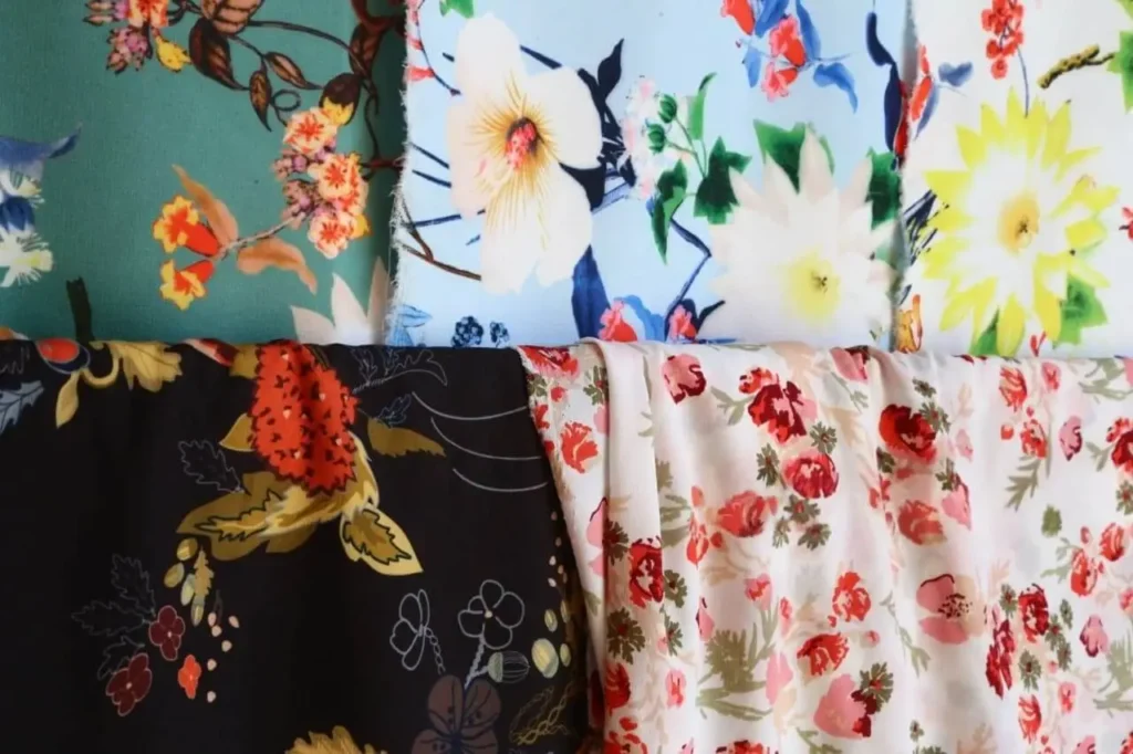 Close-up texture of fabric rayon challis showing smooth lightweight weave