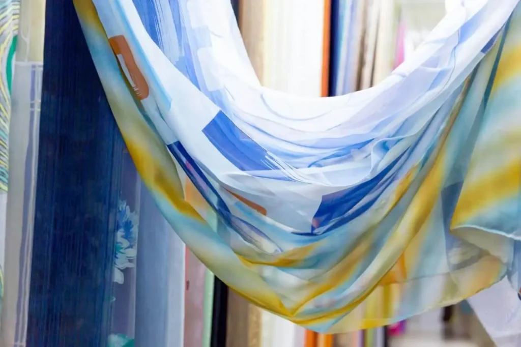 Sheer fabric printing applications including printed mesh and organza