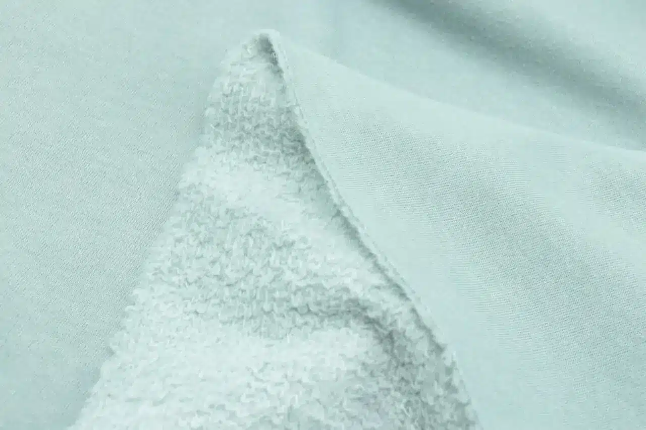 Close-up of fleece cotton fabric showcasing its softness and texture