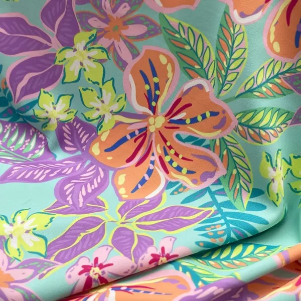 SPF50+ swim fabric showcasing its quick-drying properties for water activities