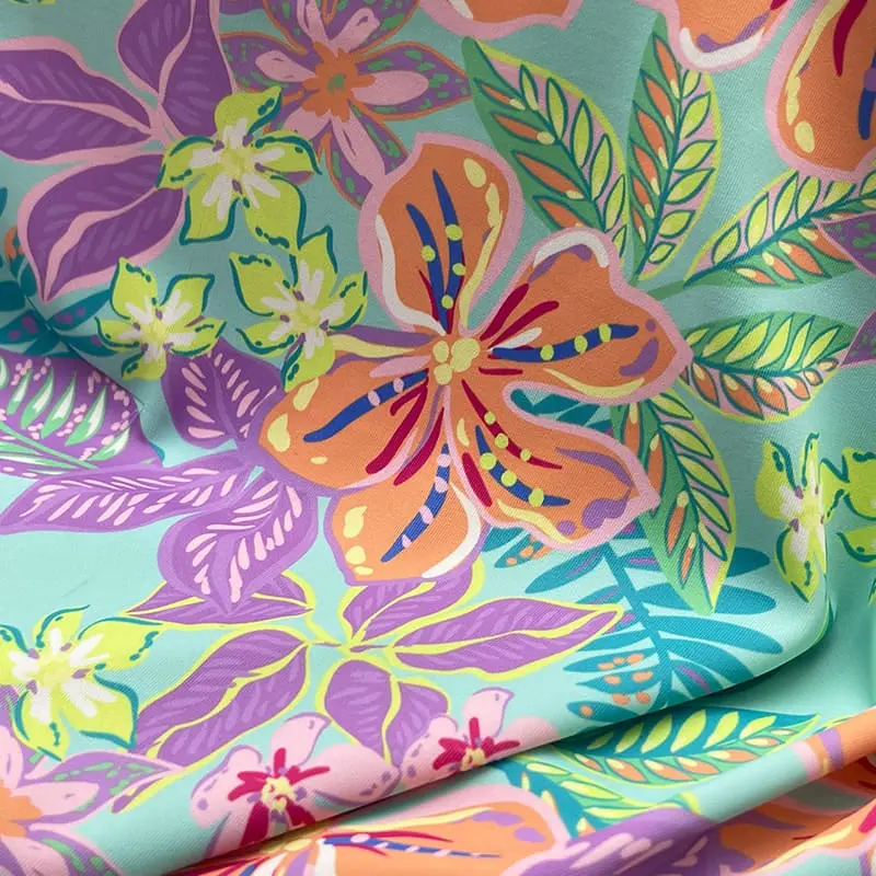 SPF50+ swim fabric showcasing its quick-drying properties for water activities