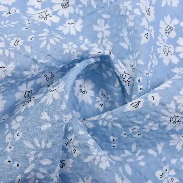 DIY craft project using Cotton Stripe Voile Fabric, such as quilting