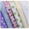 A roll of Cotton Stripe Voile Fabric ready to be cut and used in projects