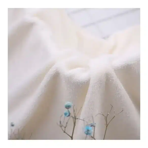 Eco-friendly production process of Bamboo Cotton French Terry fabric, showcasing sustainable fabric manufacturing