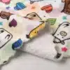 Cozy home décor items like blankets and cushions made from Polyester Flannel fabric