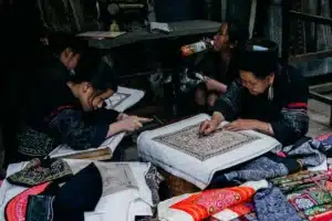 Fashion designer selecting fabric from a custom fabric maker