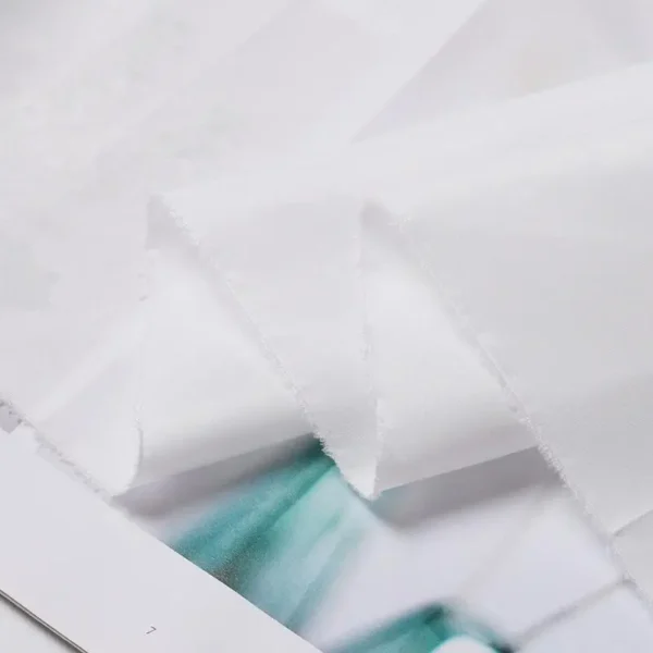 lightweight-soft-poly-pongee-fabric-drape-test Soft and lightweight drape of dull poly pongee fabric polyester material