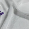 Rayon satin fabric with smooth glossy texture