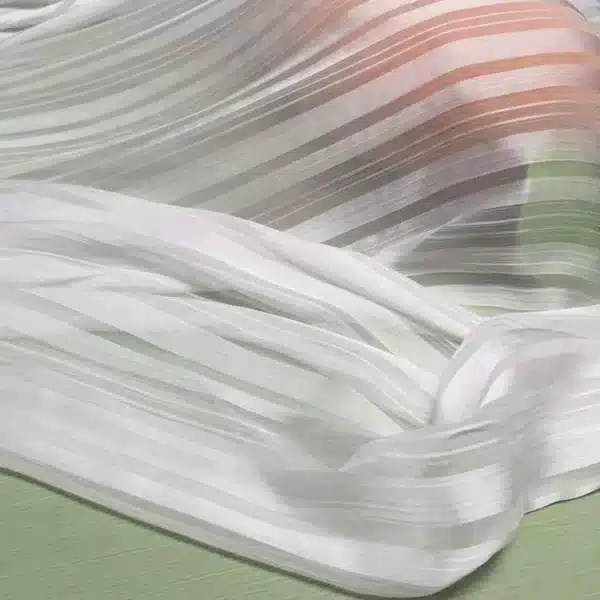 Close-up of silver stripe jacquard chiffon fabric texture