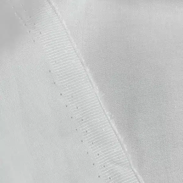 Close-up of smooth and glossy Tencel Satin Fabric texture