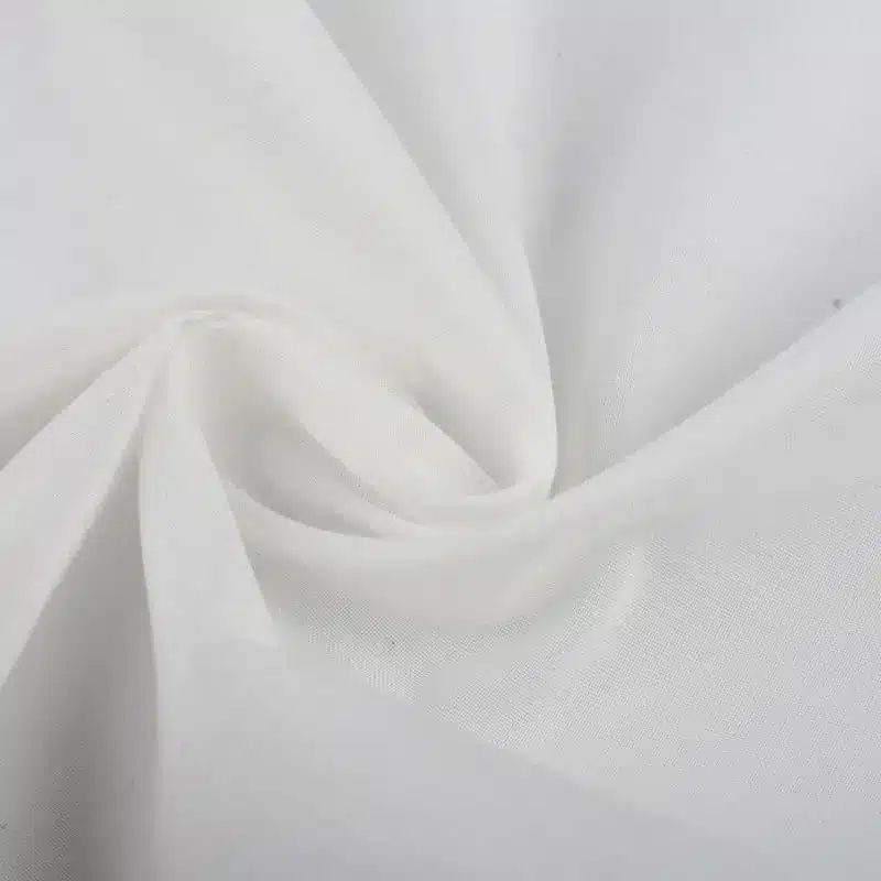 White cotton voile fabric with soft flowing drape