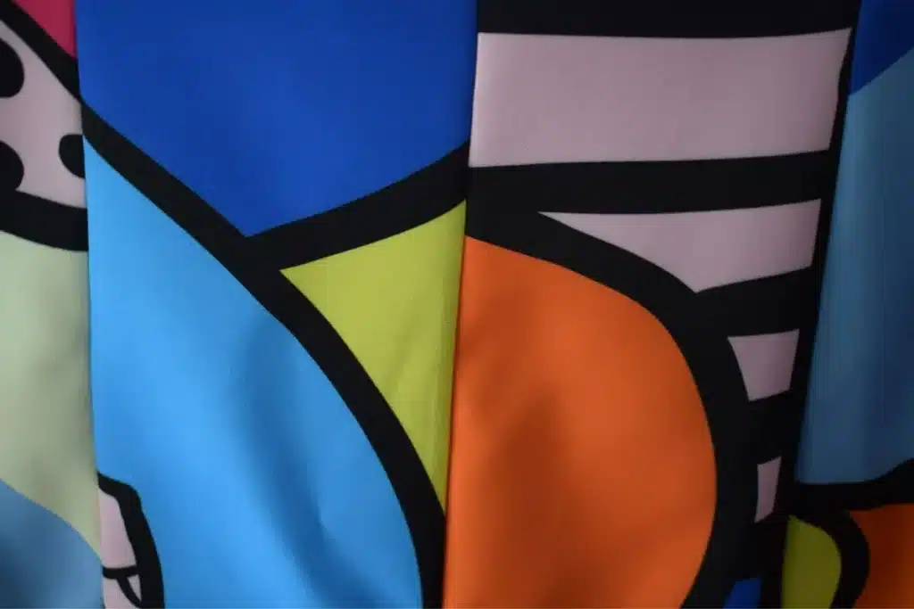 Custom digital printing process on microfiber fabric by the yard showing colorful textile design and pattern creation for custom duvet covers