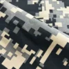 rayon-twill-fabric-custom-design Designer customizing Rayon Twill Fabric patterns