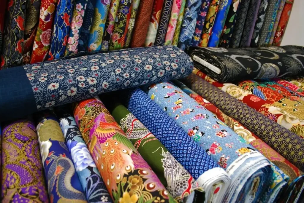 Different fabrics suitable for custom logo printing including cotton polyester and linen