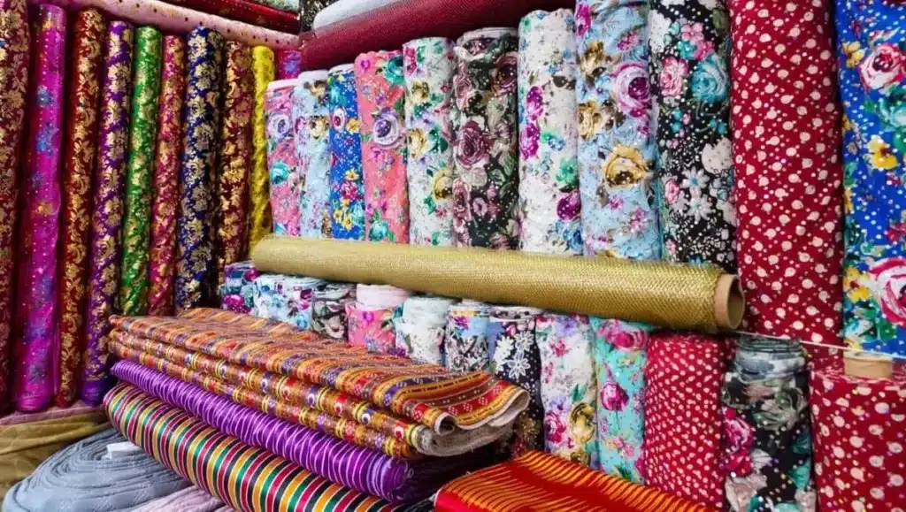 Fabric printing cost comparison by cotton polyester linen and specialty textile materials