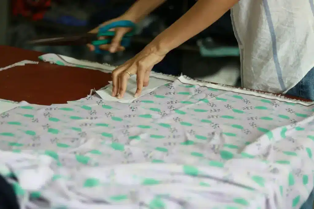 Benefits of custom fabric printing for small businesses including unique designs small batches and brand identity