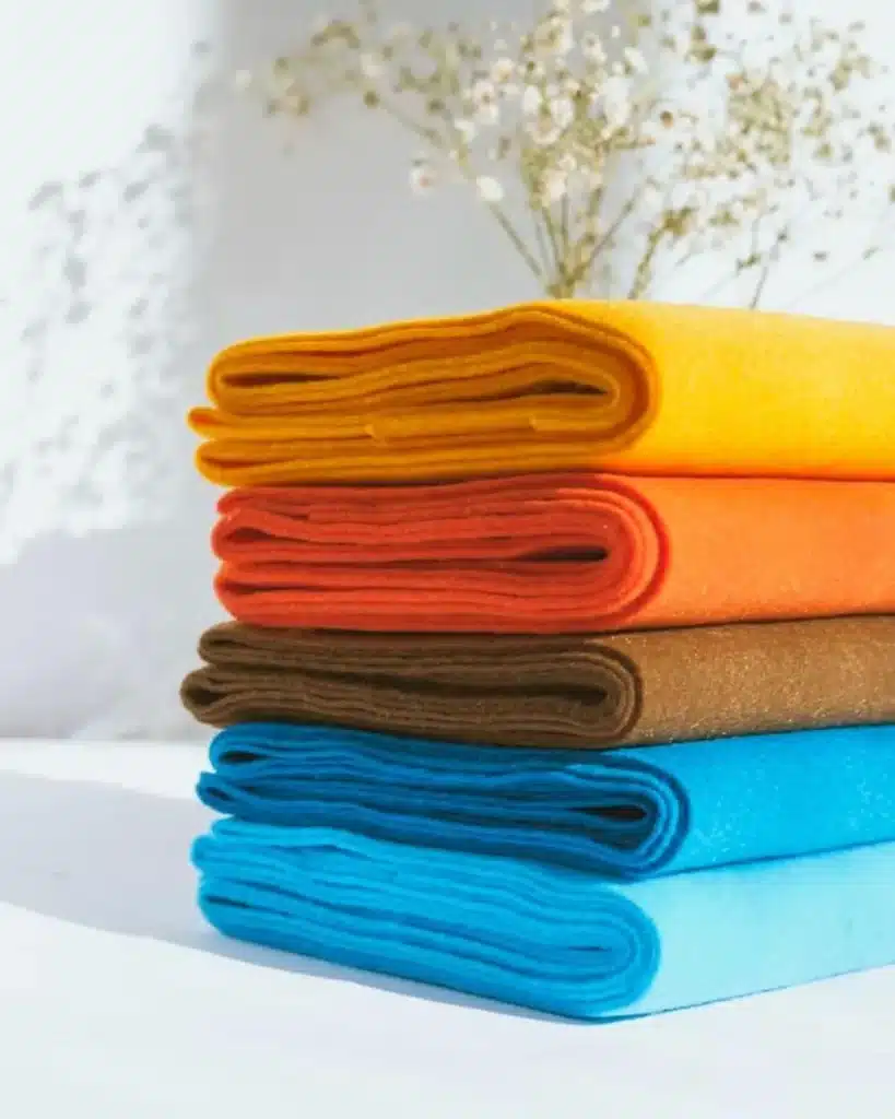 Custom printed fleece fabric applications including baby blankets jackets hoodies home textiles and pet products