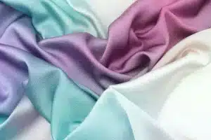 Custom printed satin fabric with elegant patterns for dresses scarves and luxury textile products