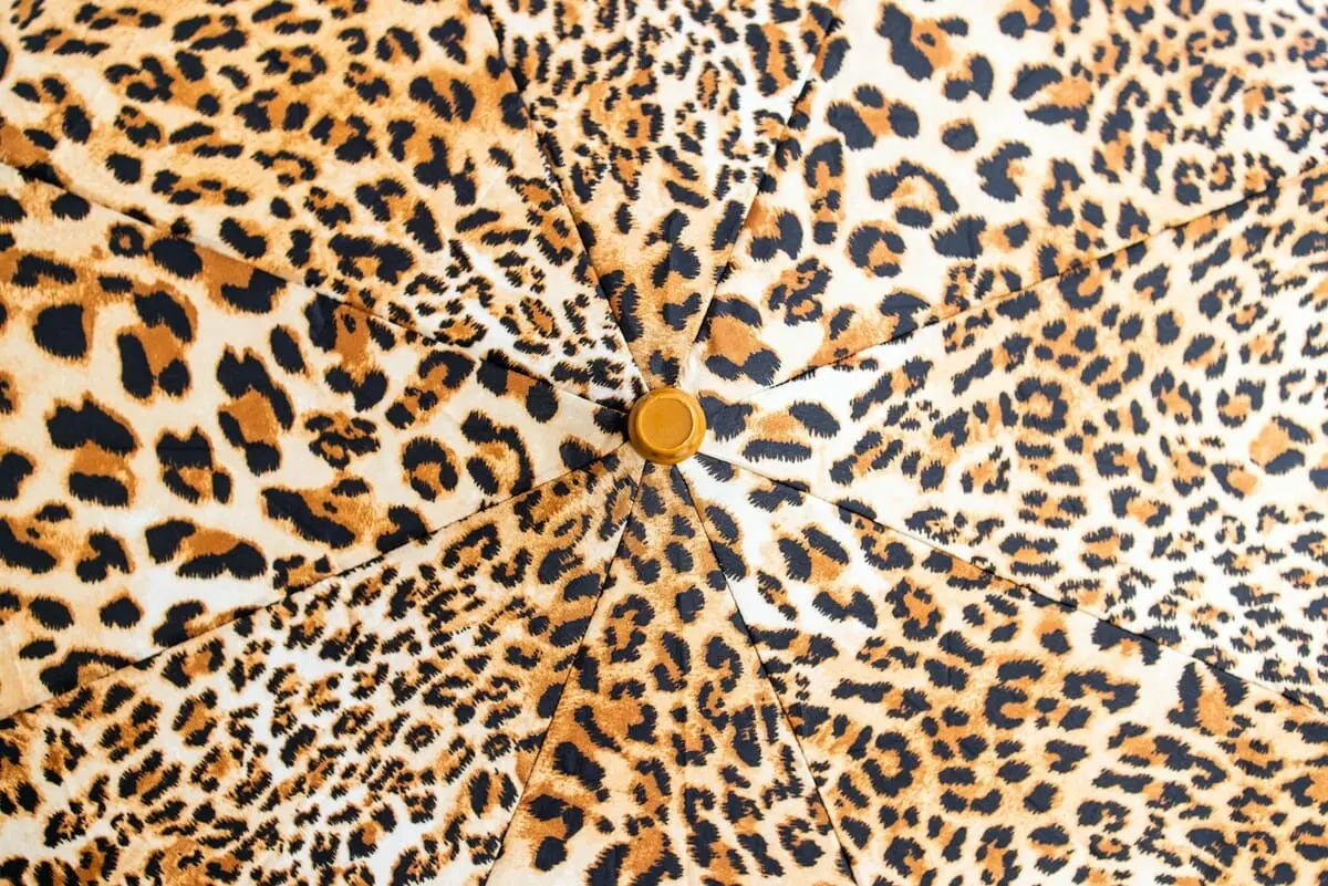 Custom animal print fabric featuring leopard zebra and tiger patterns for fashion textiles