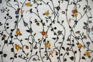 Custom botanical fabric printing featuring leaf and plant inspired textile patterns