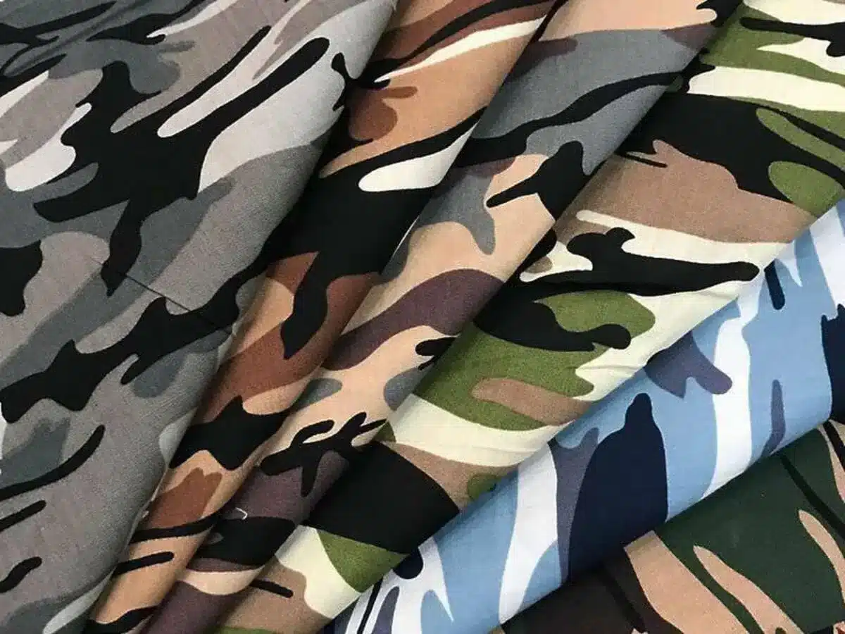 Custom camouflage print fabric featuring woodland desert and urban camo patterns