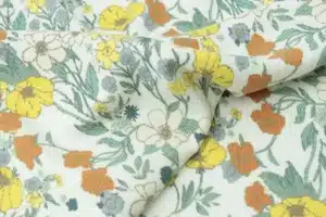 Lightweight cotton lawn fabric by the yard with a fine woven texture and soft drape
