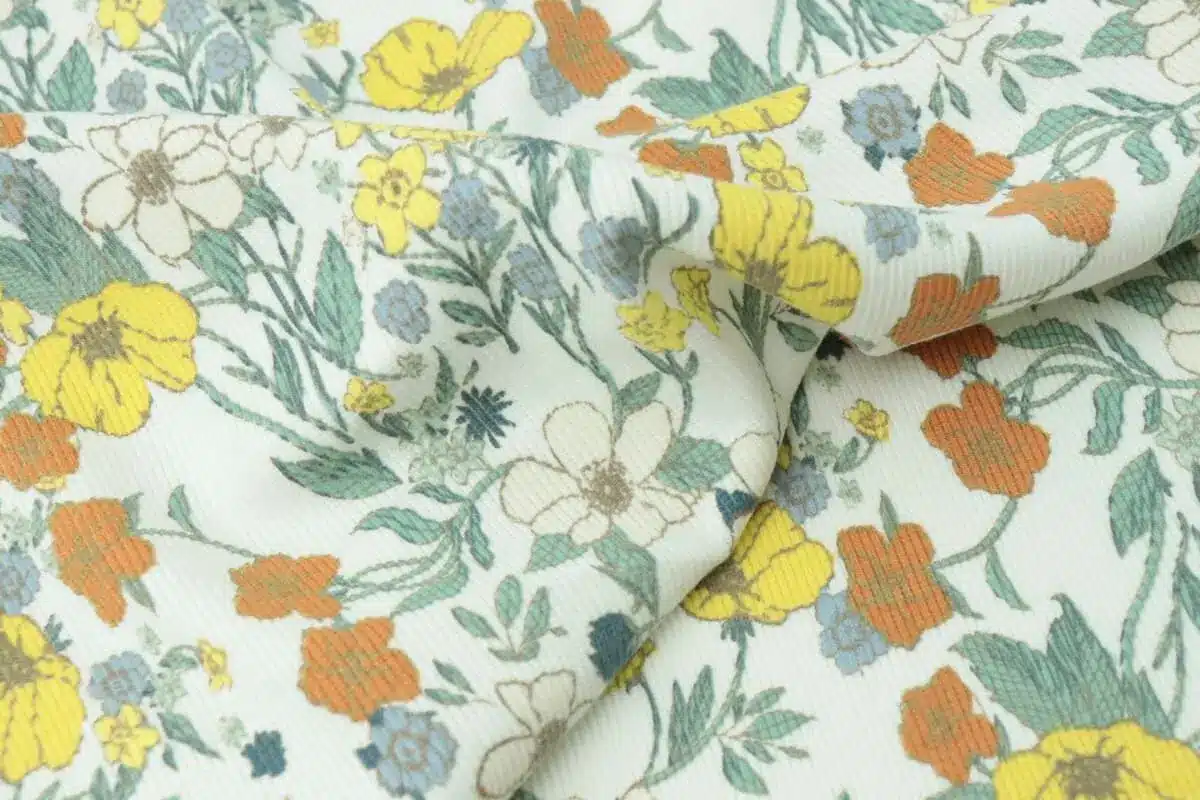 Lightweight cotton lawn fabric by the yard with a fine woven texture and soft drape