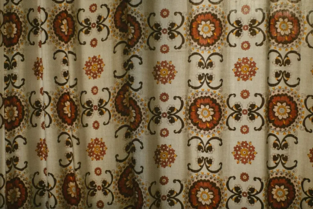 Custom geometric printed fabric applications including clothing bags curtains cushions and accessories