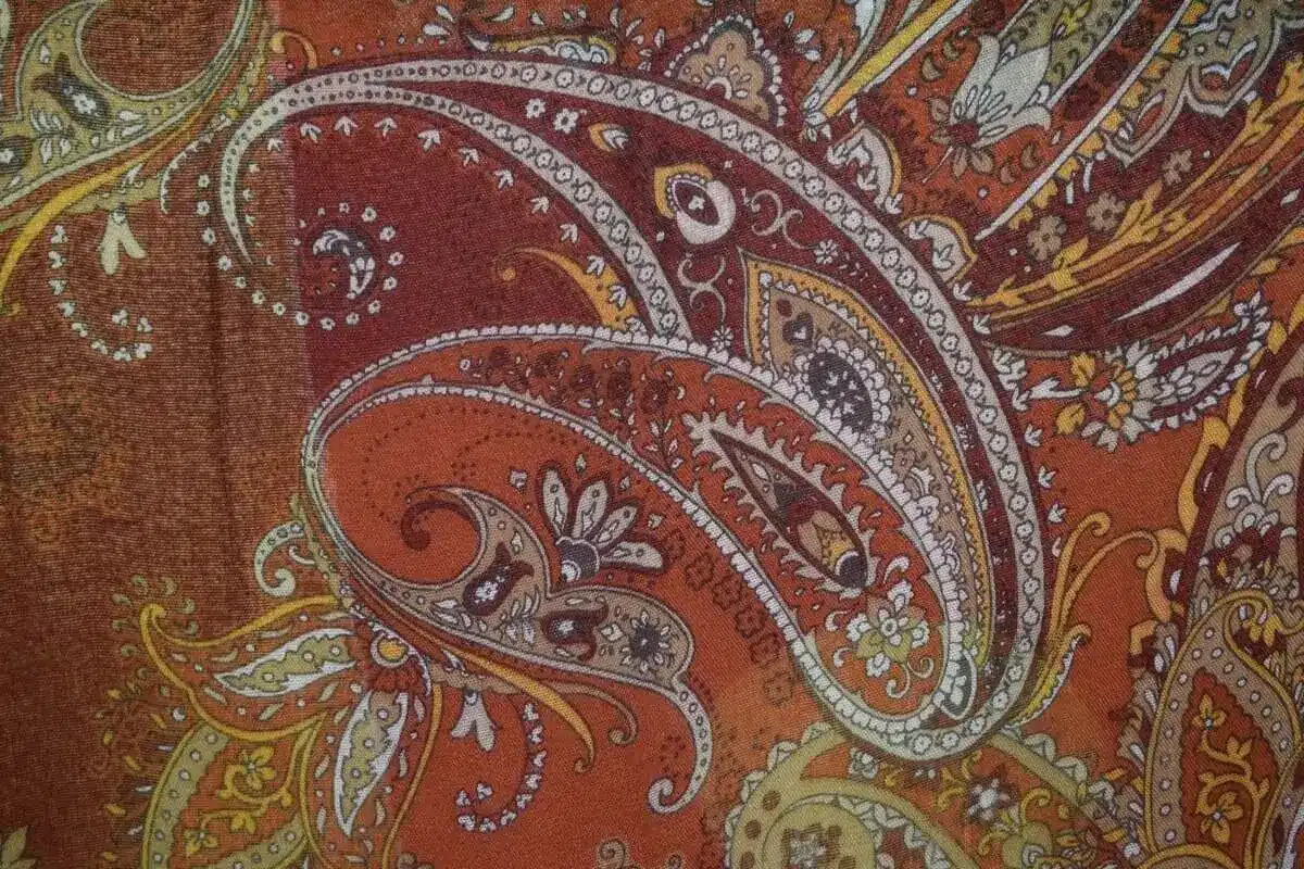 Custom paisley fabric printing featuring colorful paisley pattern designs on textiles