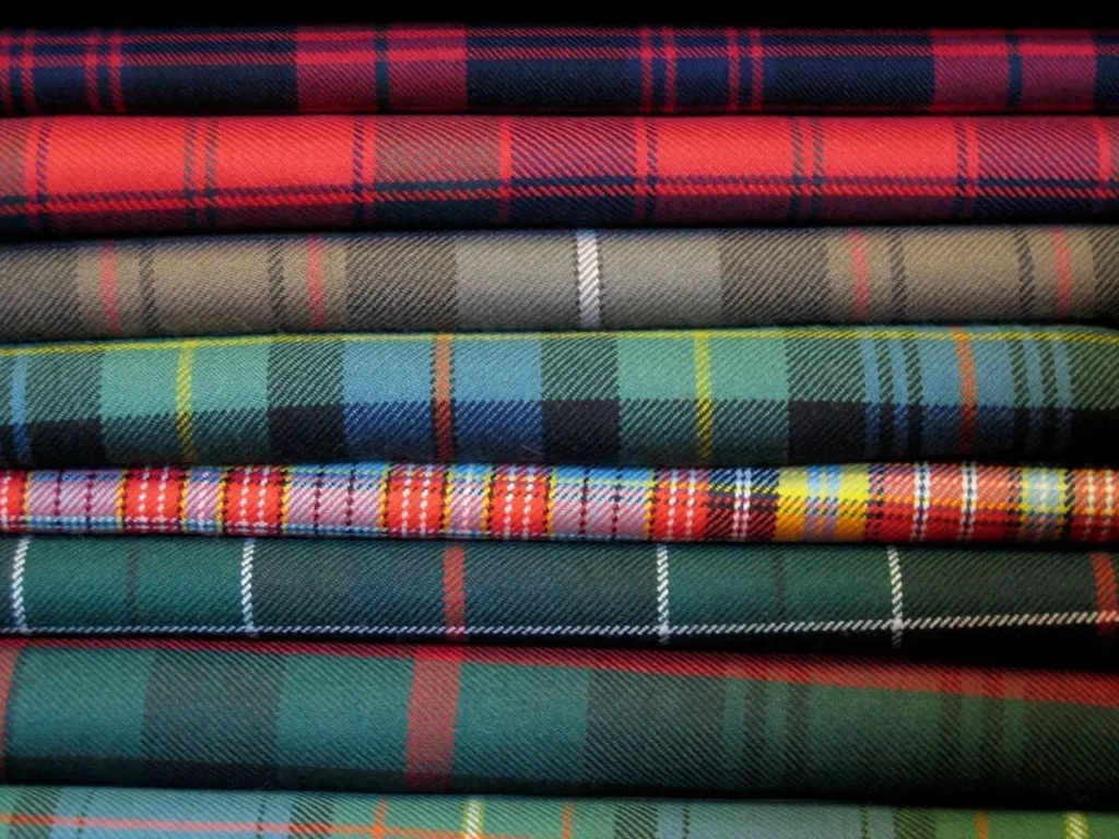 Types of plaid and checkered fabric patterns including gingham buffalo check windowpane and tartan-inspired designs